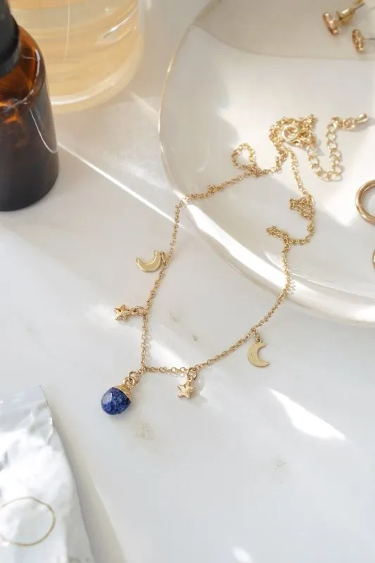 Xander Kostroma Gold Tone Lapis Lazuli Moon and Stars Charm Necklace – 42 cm   extension Statement Pendant Necklace for Women, Boho Jewelry, Healing Lapis Lazuli, Celestial-Inspired Gift for Astrology & Spiritual Enthusiasts